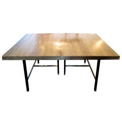 A Dining Table by Harvey Probber in Rosewood