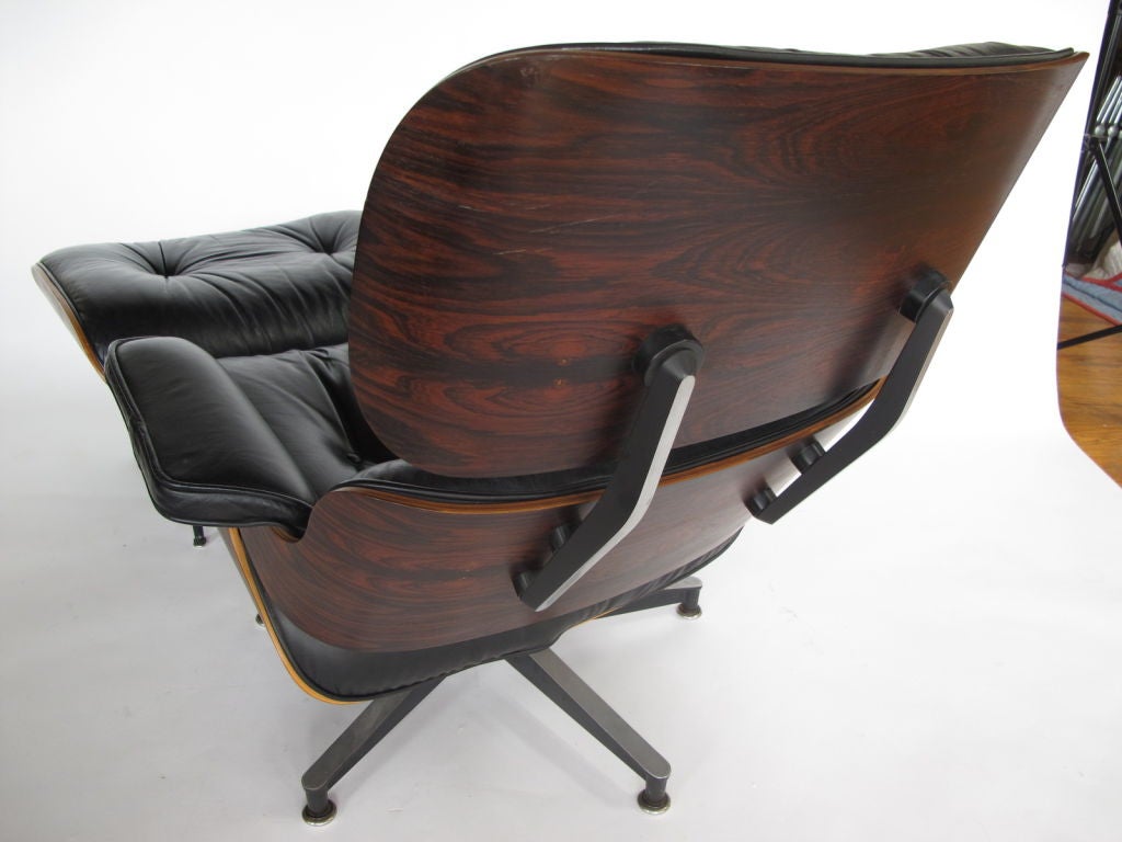 A Charles Eames for Herman Miller lounge chair and ottoman, manufactured in 1977. Black leather and rosewood. Matched chair and ottoman in excelelnt condition.