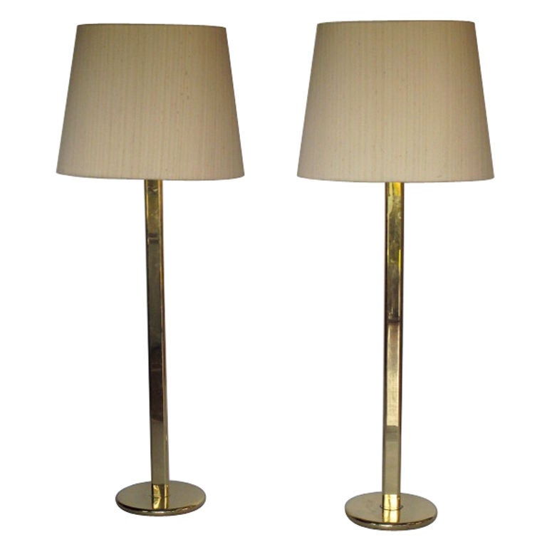 A Pair Elegant Floorlamps In Polished Brass For Sale