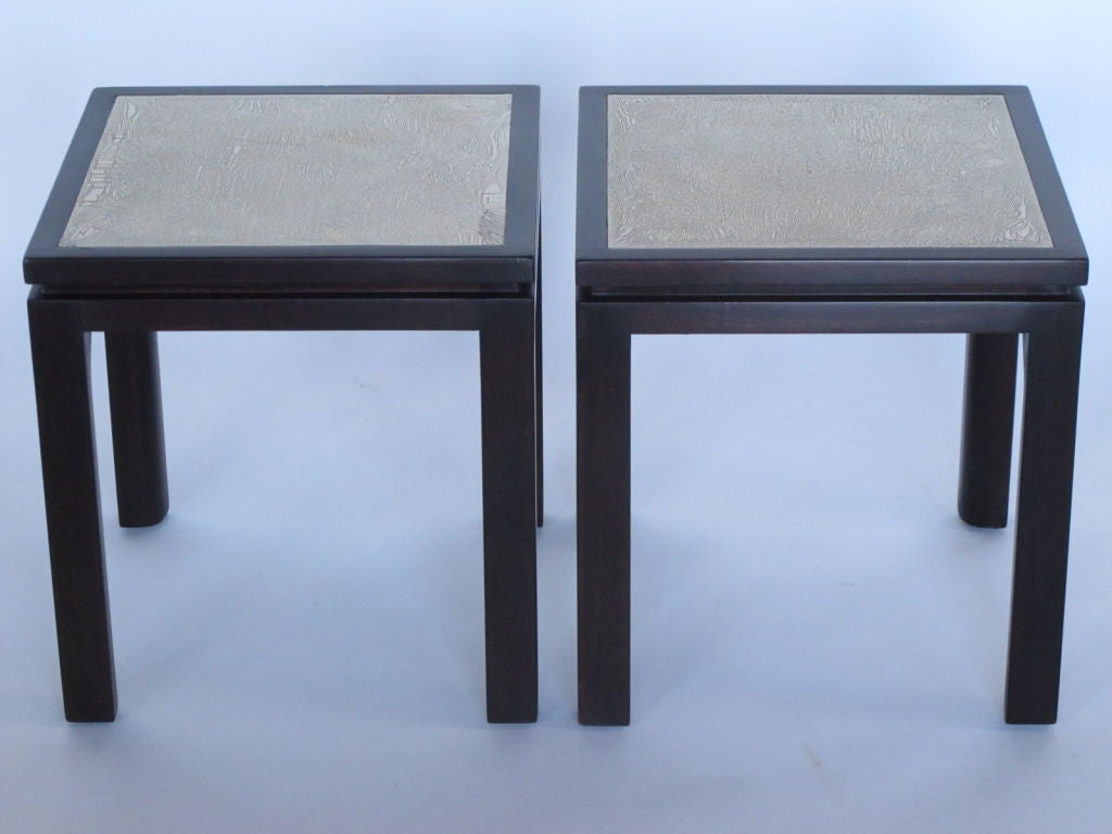 A pair of unusual, square shaped tables by Harvey Probber. The etched enamel tops were custom made by Arpad and Ilona Rosti who's work Probber incorporated into his furniture designs in the 1950's and early 60's. Mahogany frames with legs rounded