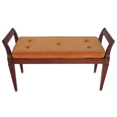 A Classic Upholstered Bench by Baker With Caned Seat