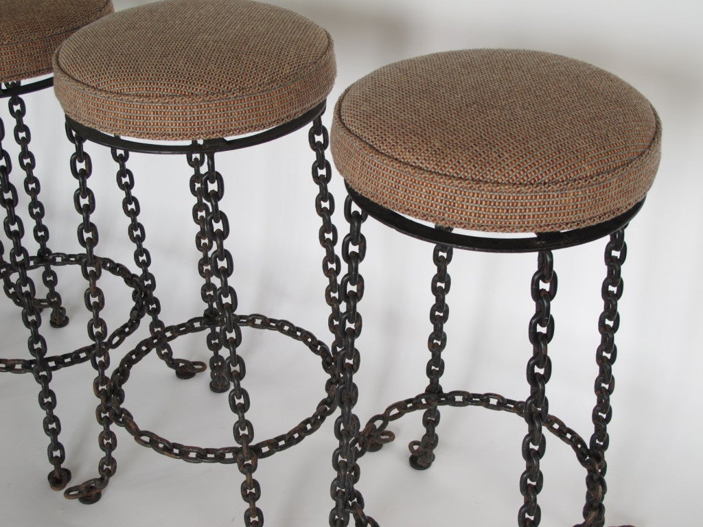 A great set of chain link, swiveling bar stools. Swivel by Seng Co, Chicago, dated 1964. Heavy and well made.