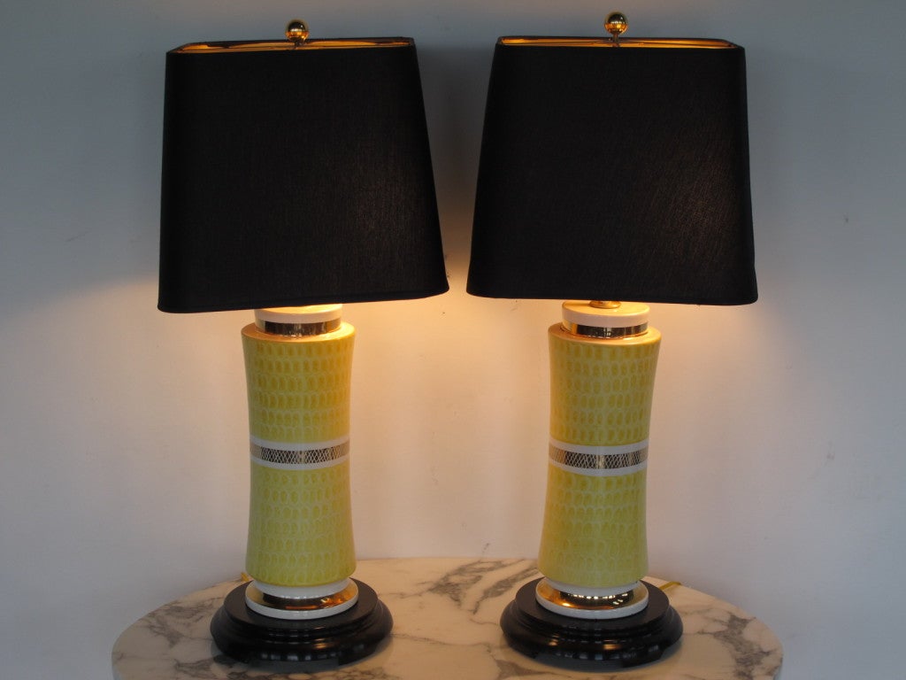 A pair of fantastic ceramic lamps by Waylande Gregory, mounted on laquered wood bases.
