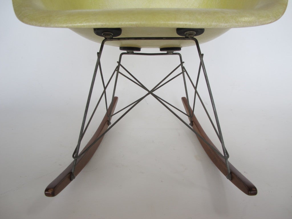 Ca' 1950 first production, Eames rocking chair, known as RAR. Lemon yellow rope edge shell, with Zenith label, zinc/birch base.