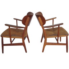 A Pair Of Hans Wegner Easy Chairs in Oak