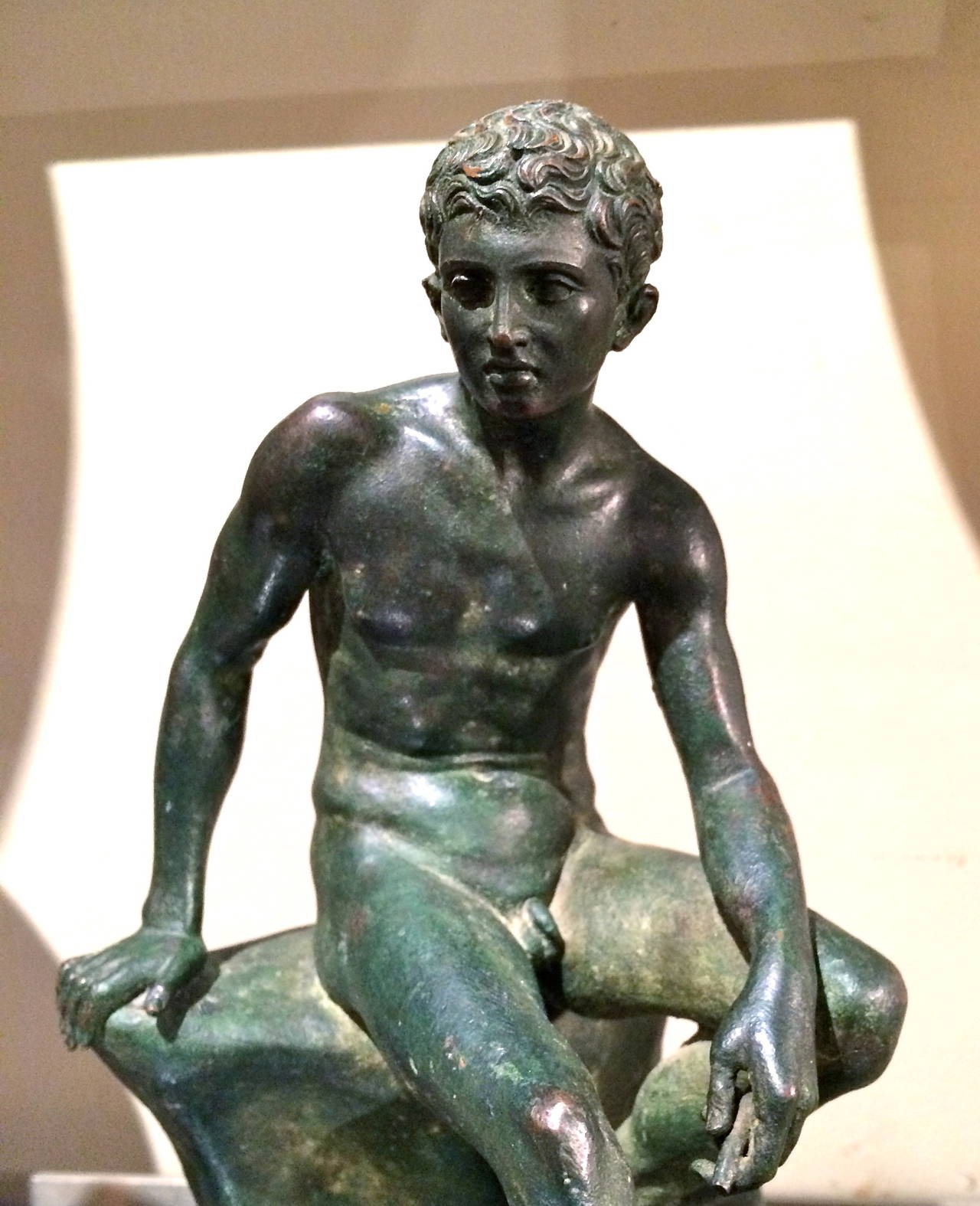 A very fine cast of the 'Seated Hermes,' after the original excavated in the 18th century. Known as the god Mercury to the Romans. 

The bronze seated Hermes, found at the Villa of the Papyri in Herculaneum in 1758, is at the National