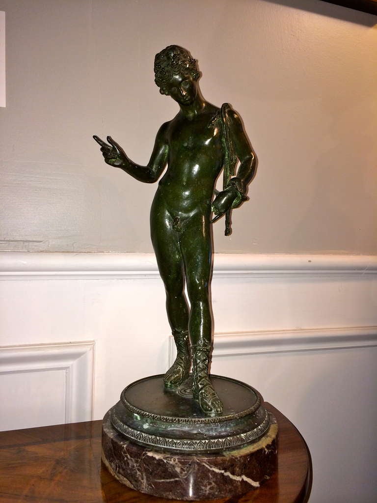 Best quality Italian bronze of Narcissus after the original excavated at Pompei in 1862. Green patina, after the antique.
Inscribed G. Nisini, signifying the work of the Giovanni Nisini bronze foundry in Rome. Nisini, whose showroom stood at 63 Via
