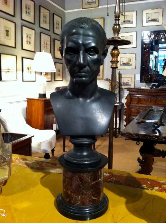 Italian bronze bust of  Roman emperor Julius Caesar on a red and black marble base. A finely cast 'Grand Tour' piece. Early 19th century.