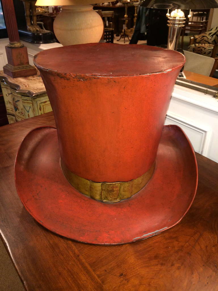 19th century American painted tin trade sign in the form of a top hat. With gilt buckle and original paint. A great decorative object.

Price reduced and FREE SHIPPING Continental USA