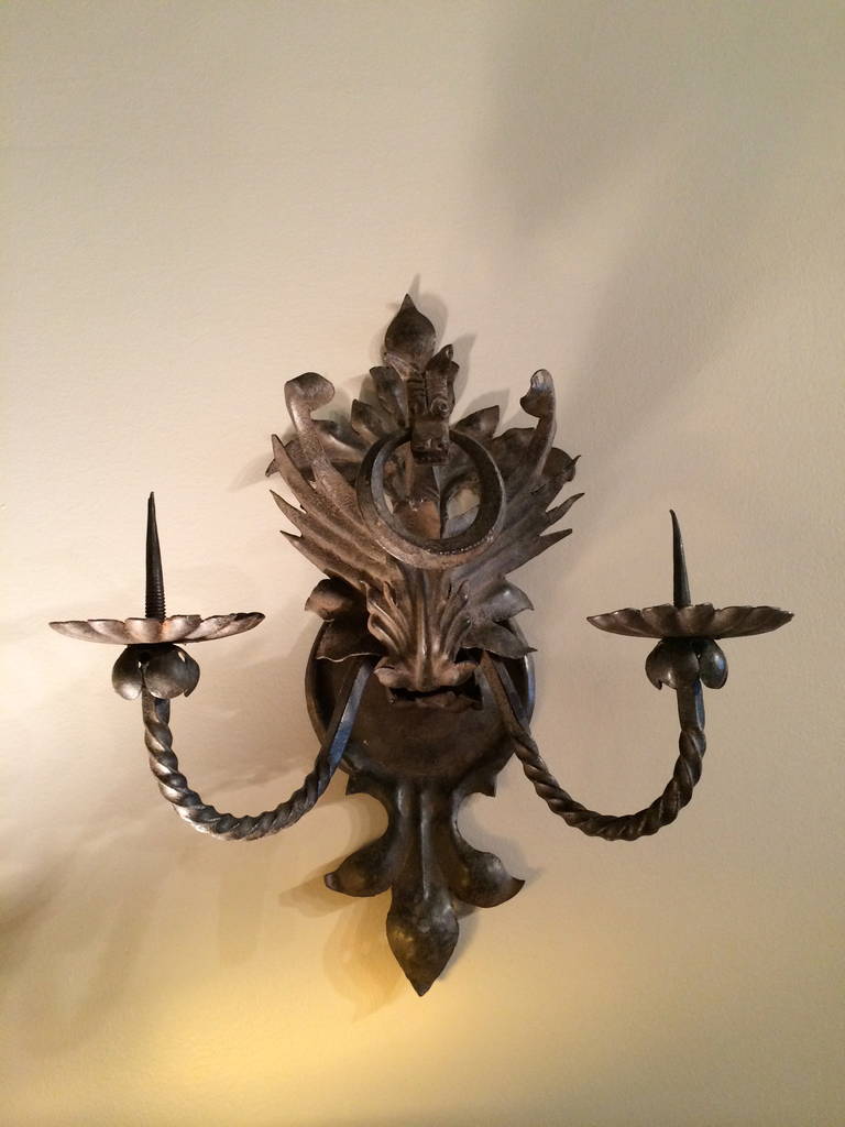 Exceptional pair of American baroque style wrought iron sconces with winged dragons. Possibly by Samuel Yellin, certainly of the same quality. Perfect for your 'Game of Thrones' room.