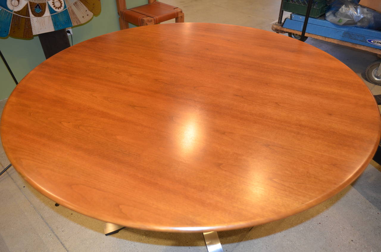 Vintage Borsani dining table, round profile, recently refinished and in excellent overall condition.