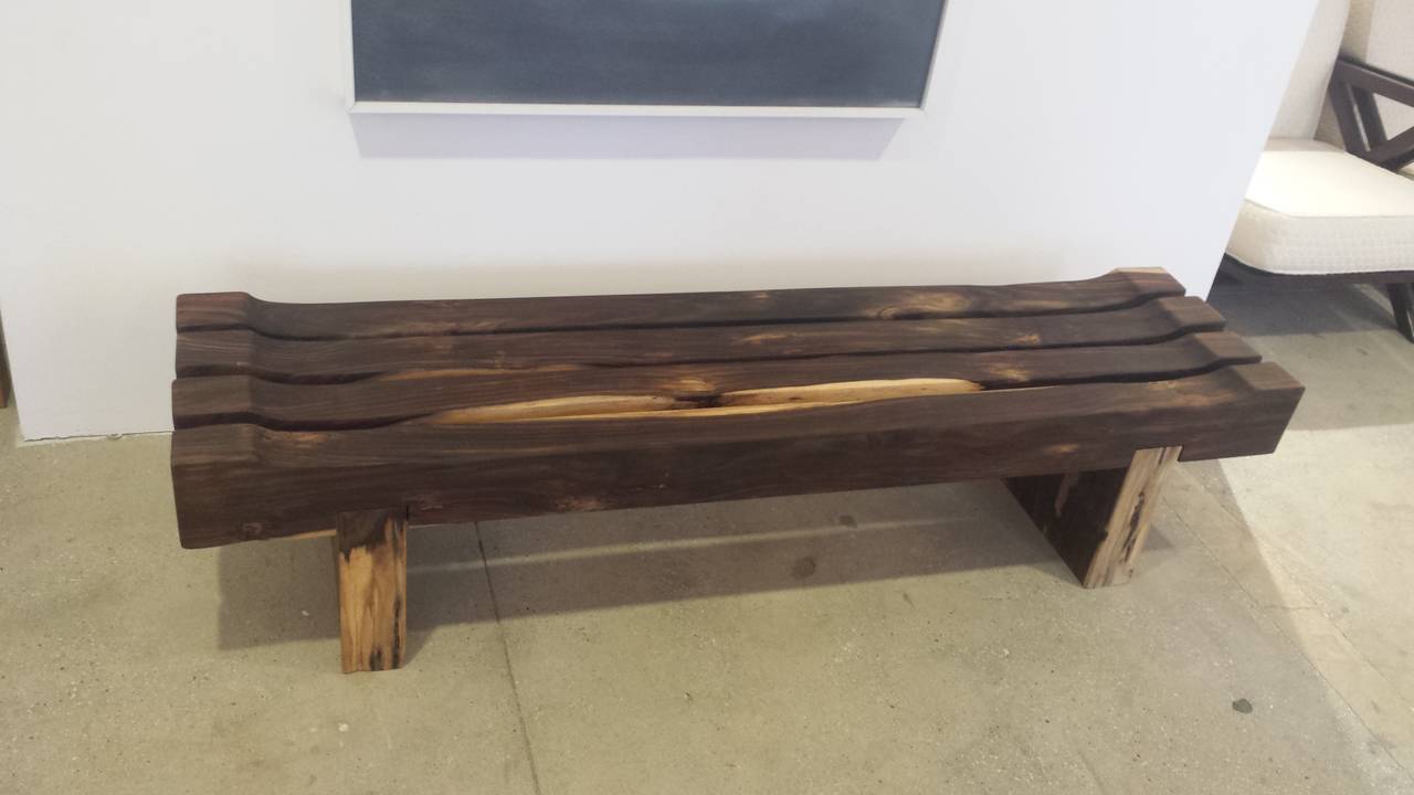 A beautiful bench with distinctive grain and nice contrasts, constructed of 6 solid pieces of Brazilian rosewood.