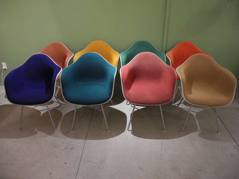 Extremely rare collection of Eames chairs with original colored upholstery, produced by Herman Miller, with each chair dated and numbered.