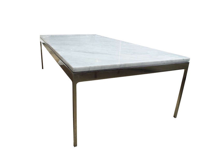 Beautiful white carrara marble sits on a solid stainless steel base.
This piece is flawlessly designed and constructed.