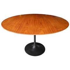 Modern Walnut and Cast Iron Round Tulip Dining Table by Eero Saarinen for Knoll