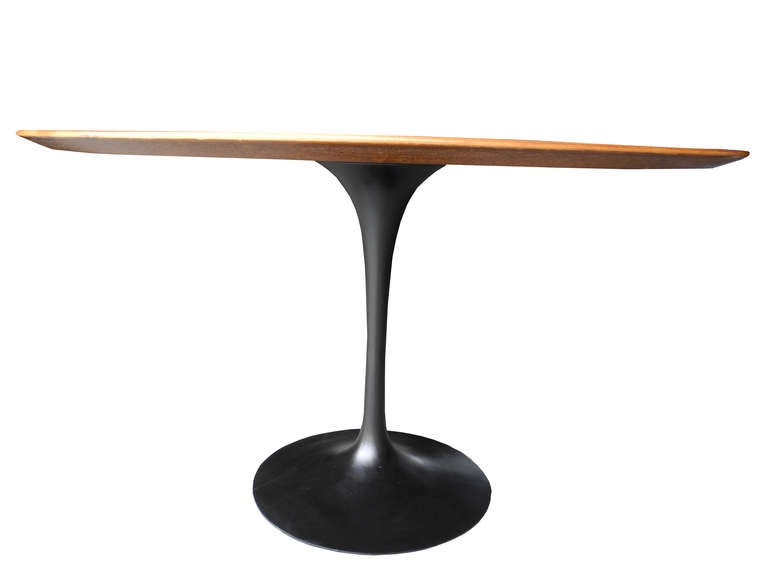 Modern Walnut and Cast Iron Round Tulip Dining Table by Eero Saarinen for Knoll