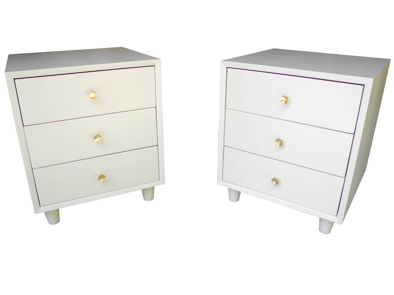 These bedside tables are made of mahogany with brass pulls.
The cases have been painted and lacquered in off white.