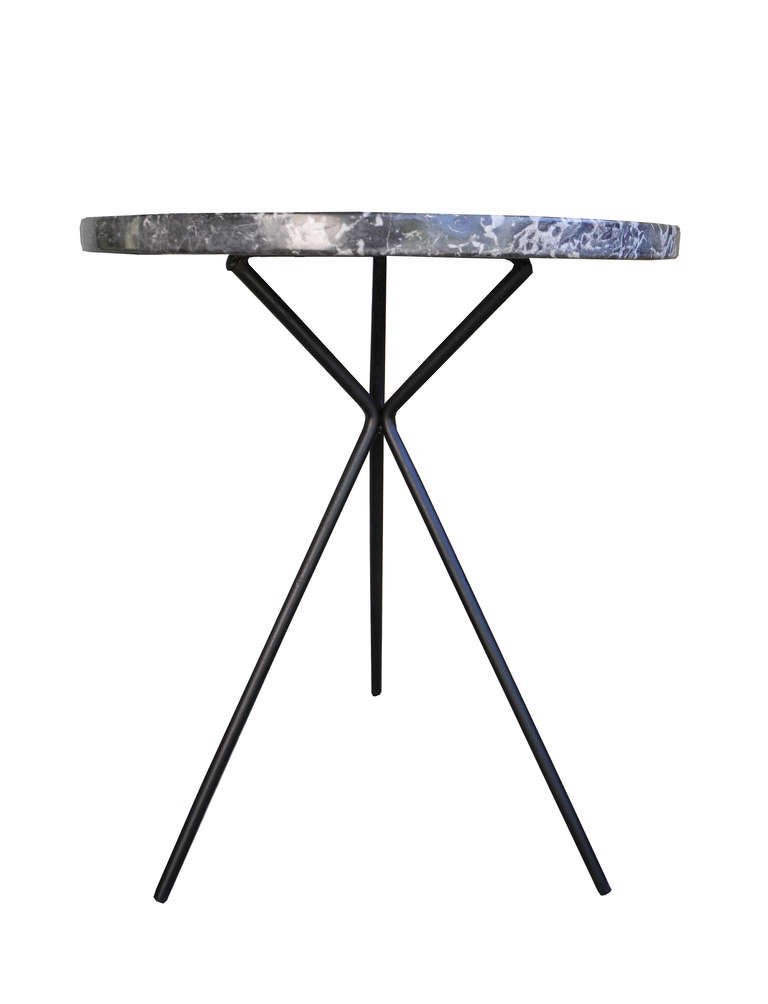 This vintage side table is simply made of iron and european gray marble.
The marble is attached to the base. A second one is available in a different color. They match in size.