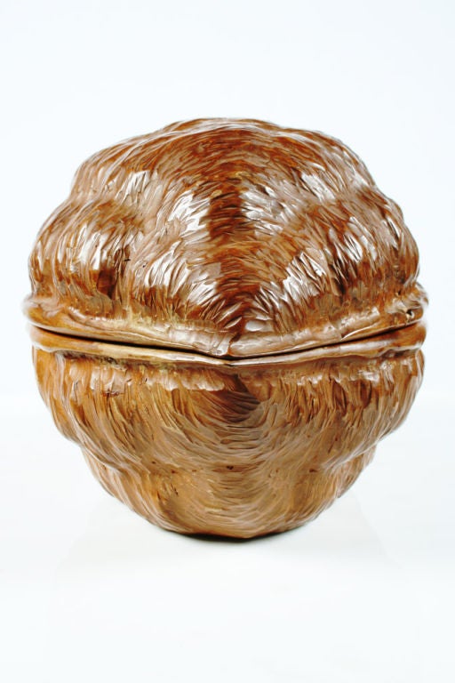 A Fantasy keepsake box made from solid wood hand-carved in the shape of a walnut shell; with a smooth polished interior and perfectly sculpted exterior, and with burned in marks to the bottom [Made in Italy G. Pecorini]. By Guglielmo Pecorini.