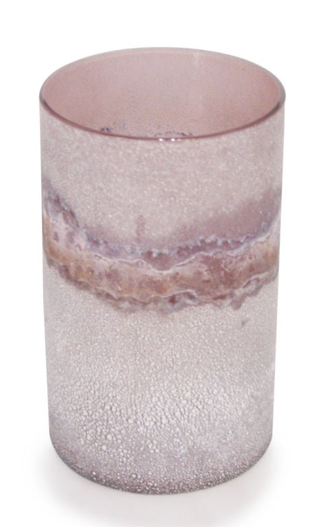 A tall vase in an elegantly simple cylindrical form in Scavo glass of subdued pink hues. Signed to the base 