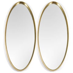 Pair of Oval Water-Gilt Frame Mirrors by La Barge