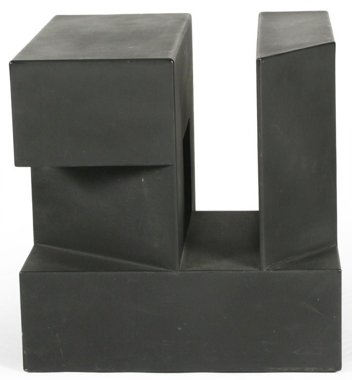 An enigmatic aluminum sculpture in a cube form with perfectly balanced negative space cut-outs in a matte black finish, by sculptor Alfredo Halegua. Uraguaian born Halegua is known for his monumental outdoor installations, residing in Washington,