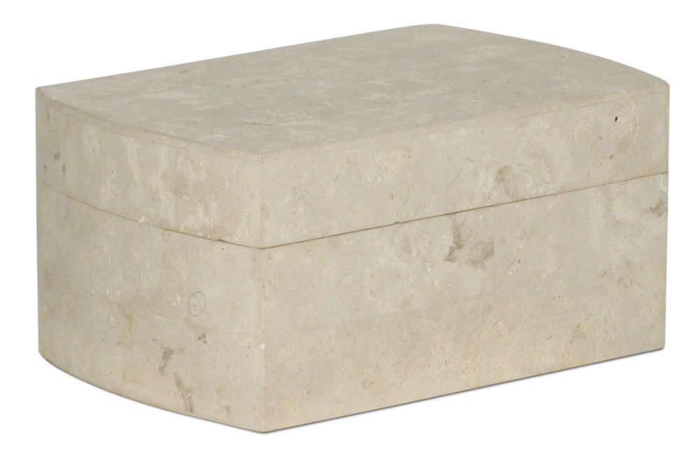 A pristine jewelry box in limestone veneer over wood in a rectangular form with bowed ends and a velvet lined interior. Philippines, circa 1980.