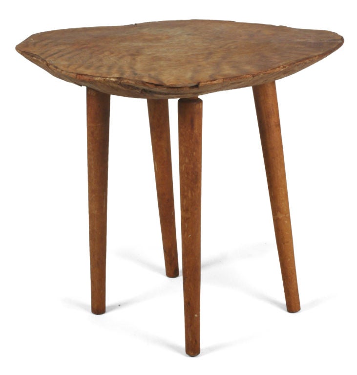 A hand-crafted side table with a free-edge single thick slab of natural burl rock maple 'sliced on the bias' and supported by four tapered wood legs. Inscribed signature to the underside [Roy Sheldon Marlboro, VT, 1966]. U.S.A., 1966.