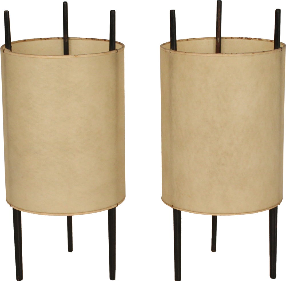 A set of three 'Cylinder' table lamps, model no. 9, each comprising three cherrywood supports and fiberglass-reinforced polyvinyl shades. Designed by Isamu Noguchi for Knoll Associates. U.S.A., circa 1945. Sold as a set or individually.

   