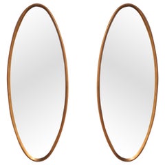 Pair of Oval Water-Gilt Frame Mirrors by La Barge