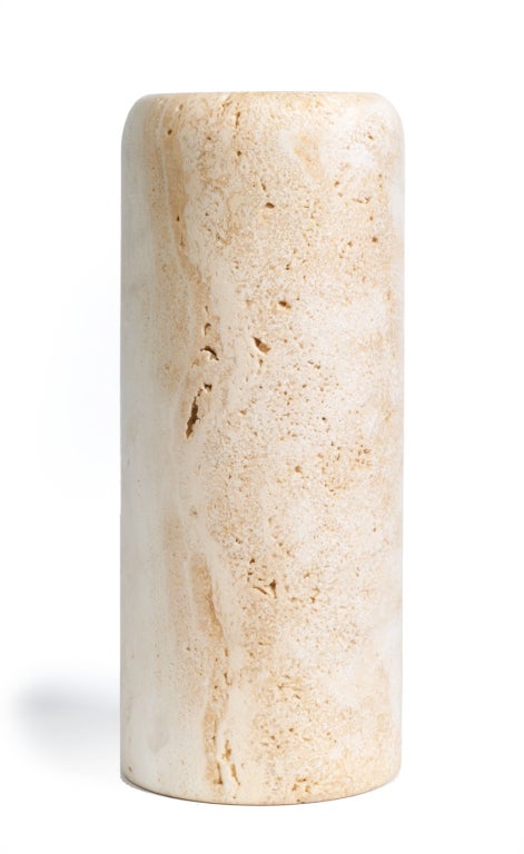 A heavy carved vase in solid travertine in a slender columnar form. After Enzo Mari. Italian, circa 1960's.
See DM# 12030316 for a larger version of this vase.