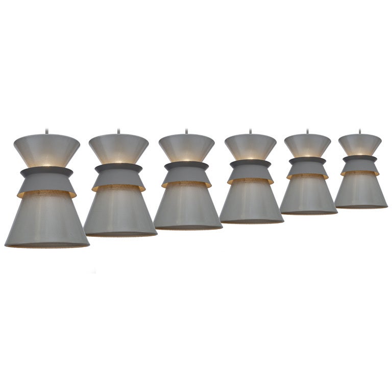 American Set of Six Perforated Double Cone Pendants by Gerald Thurston For Sale