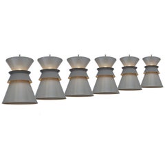 American Set of Six Perforated Double Cone Pendants by Gerald Thurston