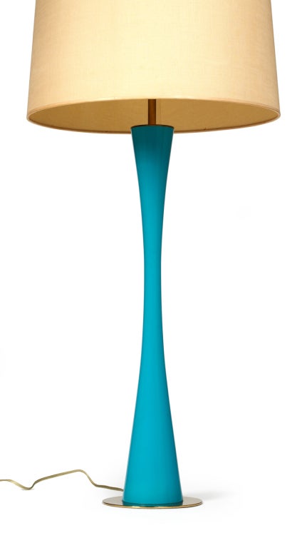 A pair of very tall Azure blue lacquered wood table lamps with solid brass disc base, disc top cap and triple cluster bulb fittings. By Stewart Ross James for Hansen, NYC. U.S.A., circa 1960.

 