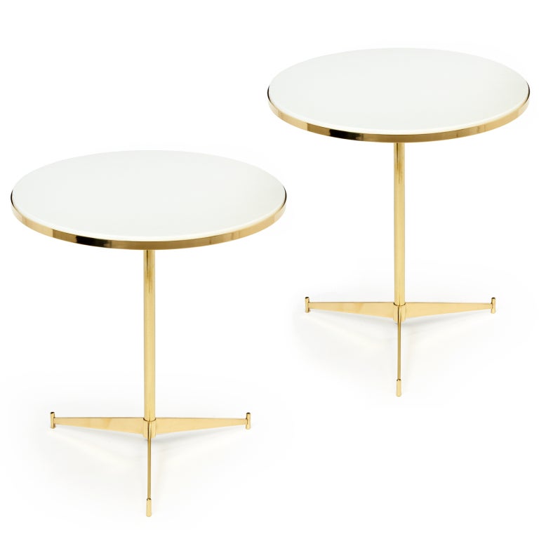 A pair of pure modernist brass and glass tripod occasional tables, mod. no. 1094 by Paul McCobb for Directional. American, circa 1950.