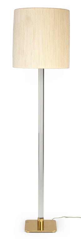 A pair of chic Minimalist floor lamps with integral three-way collar switch. The 1 1/2