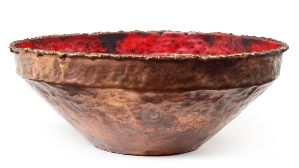 A marvelous Brutalist torch cut, hand-hammered and enameled fruit bowl by Marcello Fantoni. Italy, circa 1950.

