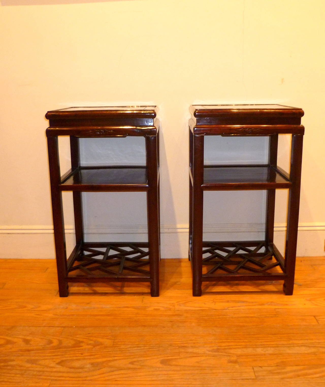 A pair fine ju mu wood end tables, geometric lattice fretwork on bottom shelves, simple form, beautiful wood grain, 19th century.