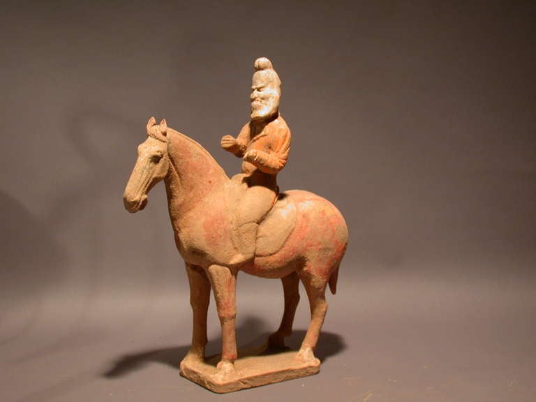 A fine and unusual statue of standing horse with a Persian rider. Tang Dynasty (618-907 AD) Silk Road trader from Persia, comes with Oxford authentication TL test certificate. Oxford TL test sample number C106t27.