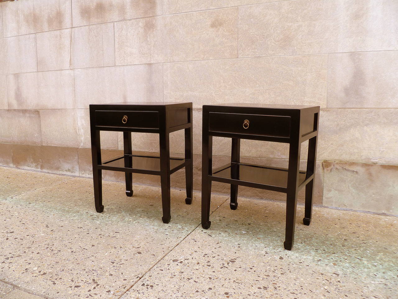 Polished A Pair of Black Lacquer End Tables with Shelf and Drawer