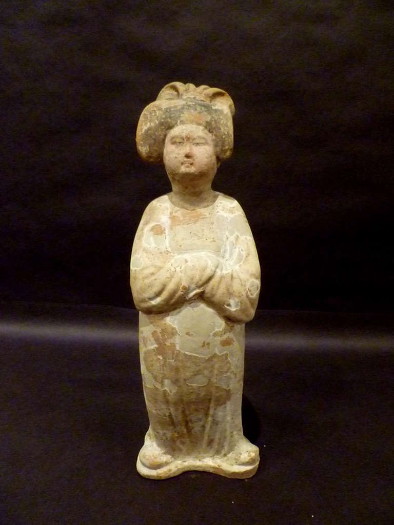An elegant pottery figure of standing court lady, superbly sculpted detail and lines, Tang dynasty 618-907, comes with Oxford authentication TL test certificate. Oxford TL test sample number C102s53.