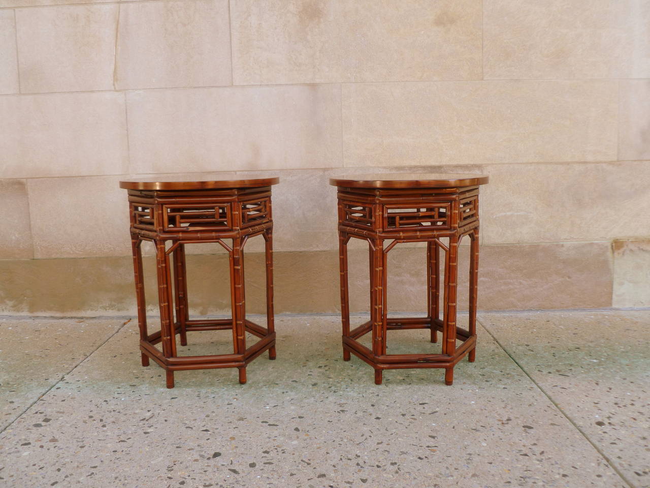 Chinese A Pair Of Round Bamboo End Tables With Black Lacquer Tops