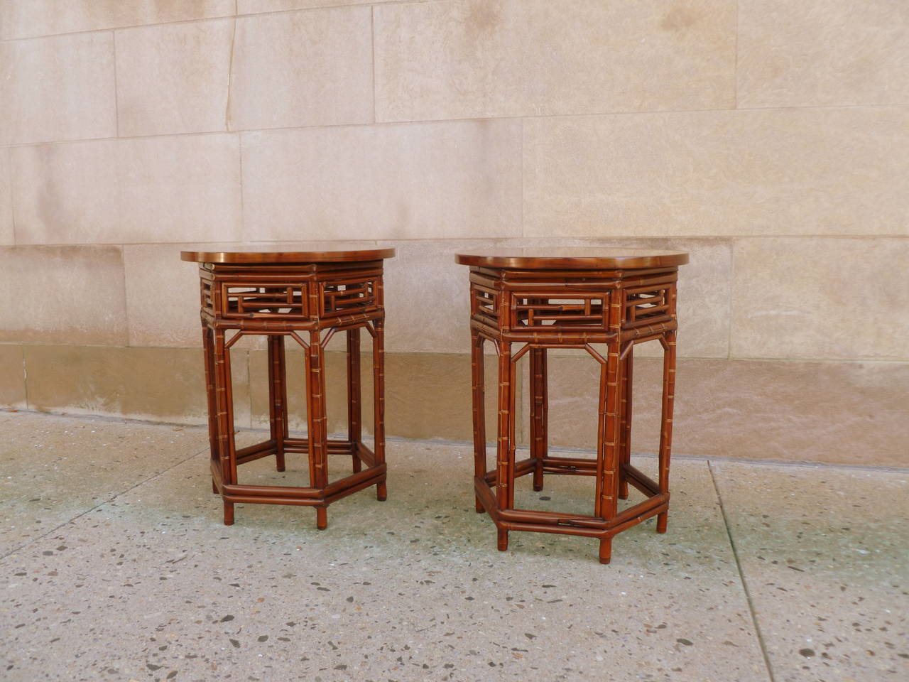 Fretwork A Pair Of Round Bamboo End Tables With Black Lacquer Tops