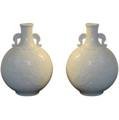 Pair of White Porcelain Vases with Under Glaze Motif