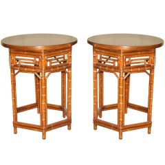 A Pair Of Round Bamboo End Tables With Black Lacquer Tops