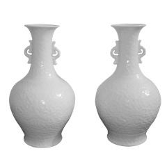 Pair Of Fine White Porcelain Vases With Underglaze Floral Motif
