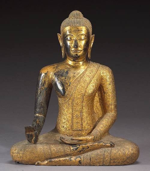 A large refined and elegant gold gilt bronze statue of meditating Buddha, benevolent facial expression, beautiful color, form and lines.