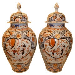 A Pair Of Fine Porcelain Chinese Imari Jars With Covers