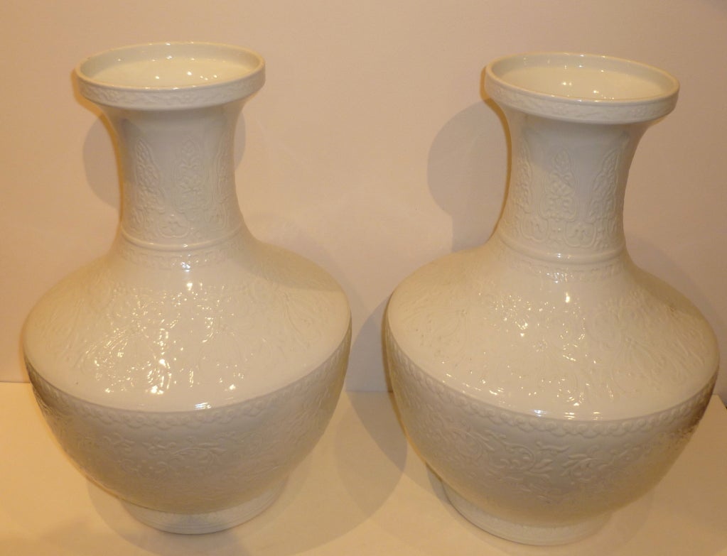 Pair of White Porcelain Vases with Under-Glaze Floral Motif In Excellent Condition In Greenwich, CT