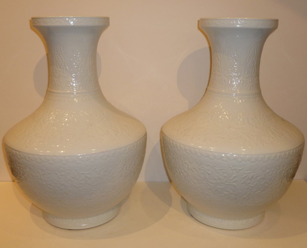 19th Century Pair of White Porcelain Vases with Under-Glaze Floral Motif